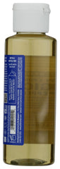 Dr. Bronner's peppermint liquid in hand demonstrating concentrated texture