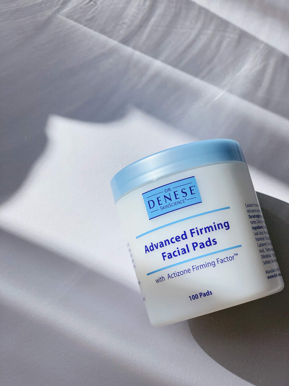 Dr. Denese close-up of pad texture illustrating gentle exfoliation