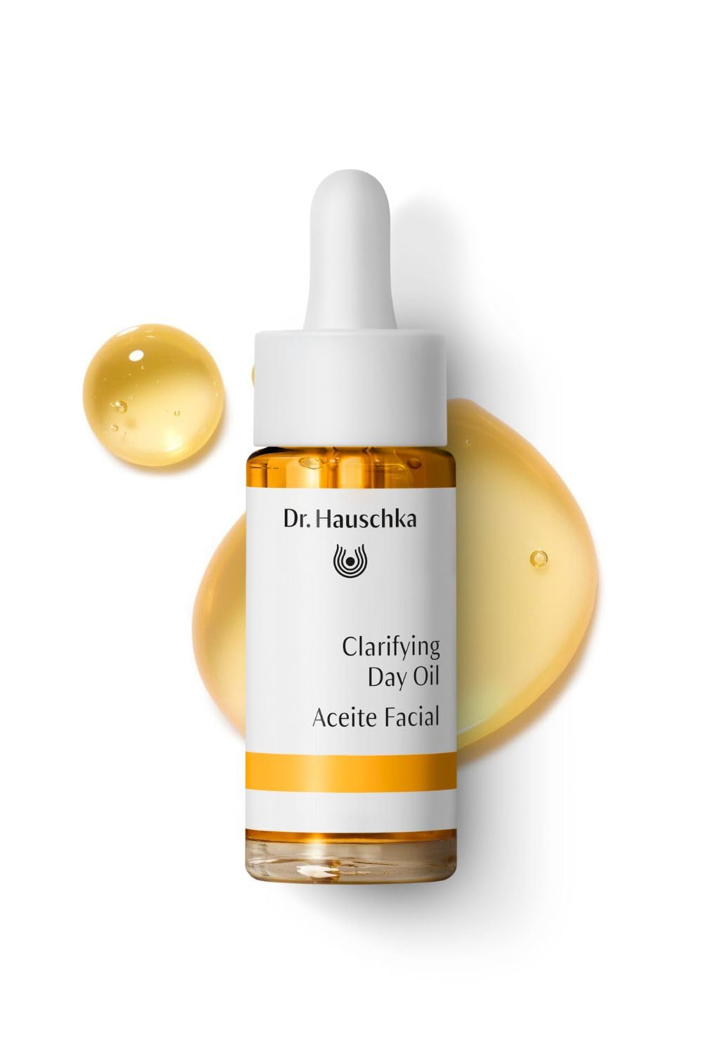 Dr. Hauschka dropper dispensing a drop, showing controlled use and easy dosing