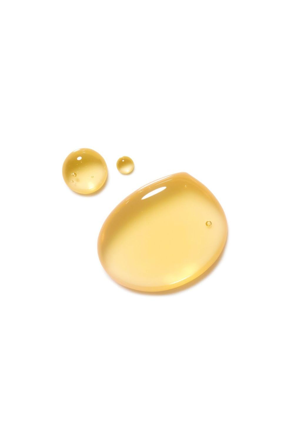 Dr. Hauschka oil texture on hand demonstrating fast absorption and lightweight feel