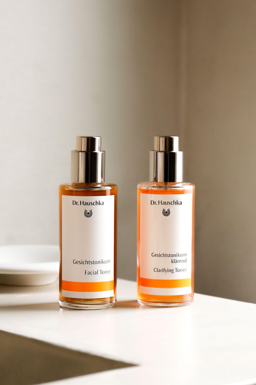 Dr. Hauschka toner on bathroom shelf lifestyle shot showing routine readiness