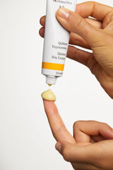 Dr. Hauschka Quince Day Cream on a bathroom shelf showing tidy daily skincare routine