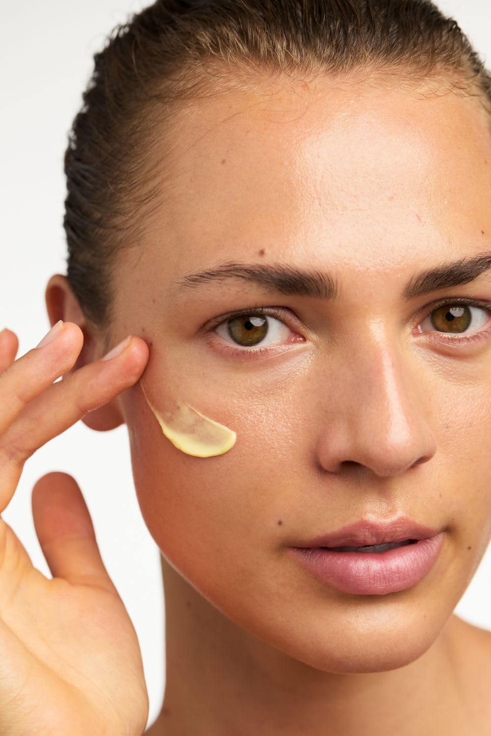 Dr. Hauschka Quince Day Cream being dispensed showing easy morning application