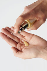 Dr. Hauschka dispensing lotion demonstrating easy-use and quick absorption