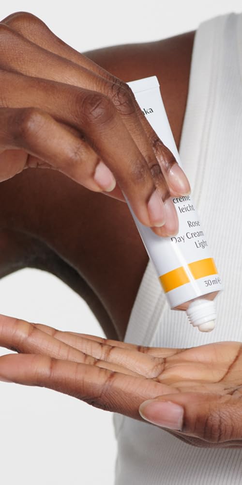 Dr. Hauschka Rose Day Cream Light being applied on hand to demonstrate smooth fast absorption