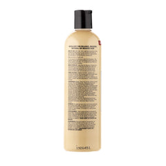 Dr. Miracle's shampoo texture pouring to show creamy conditioning benefit