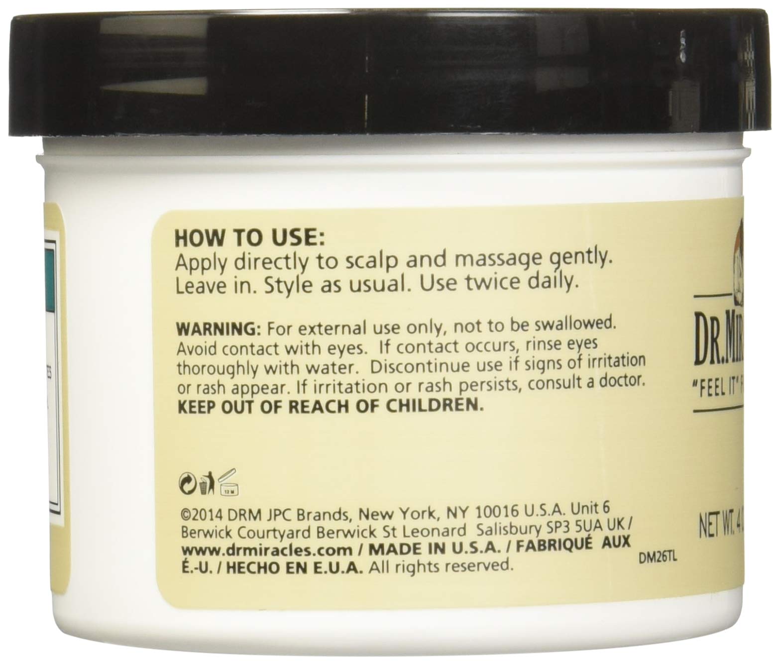 Dr. Miracle's creamy texture close-up showing rich emollients and easy spread for smooth, hydrated hair