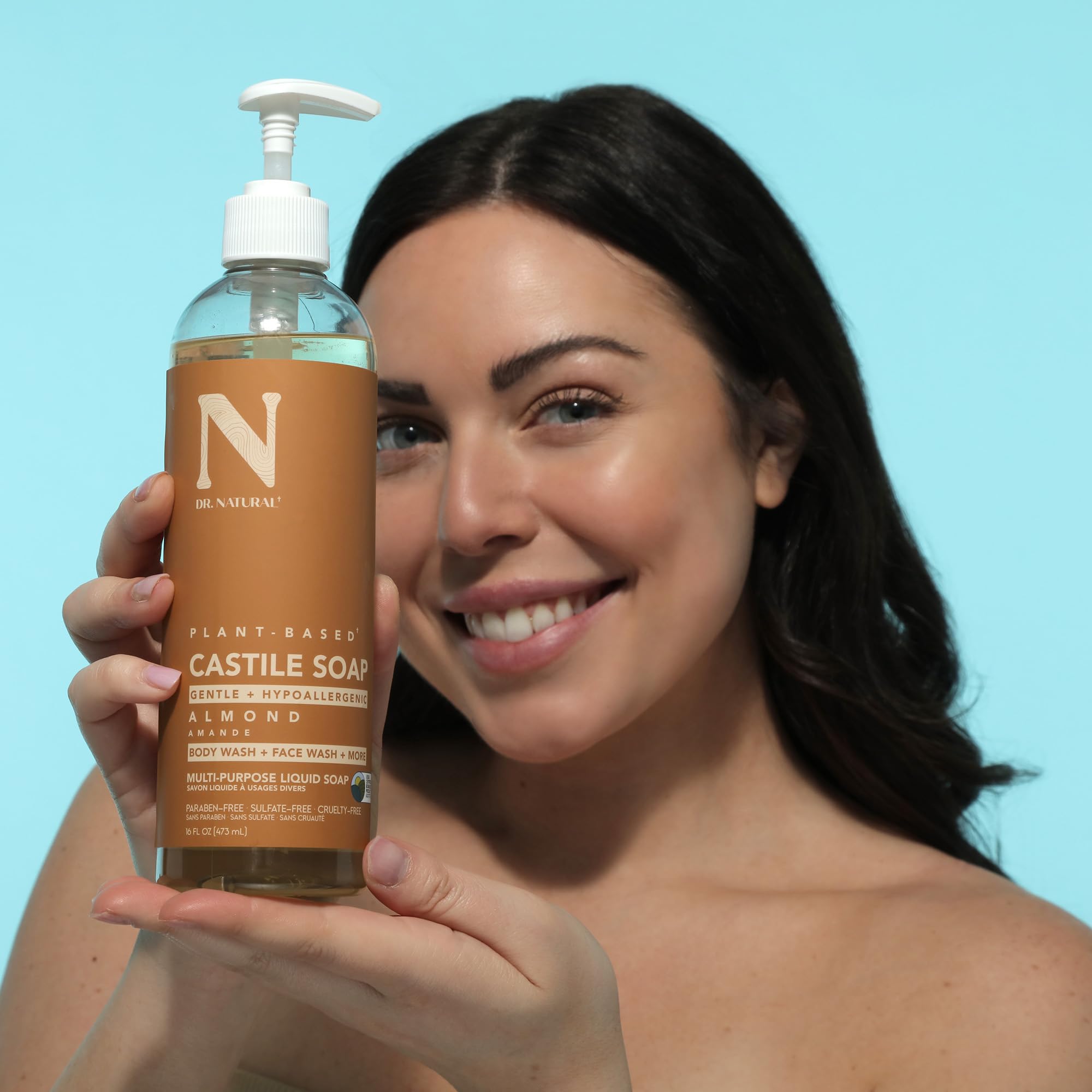 Dr. Natural bottle in shower showing practical everyday body wash use
