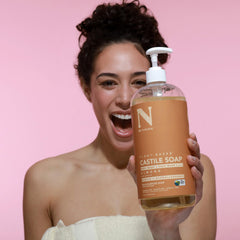 Dr. Natural face wash application on cotton pad showing mild cleansing for sensitive skin