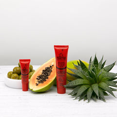 Dr. PAWPAW ORIGINAL BALM held in hand showing size and travel-friendly convenience