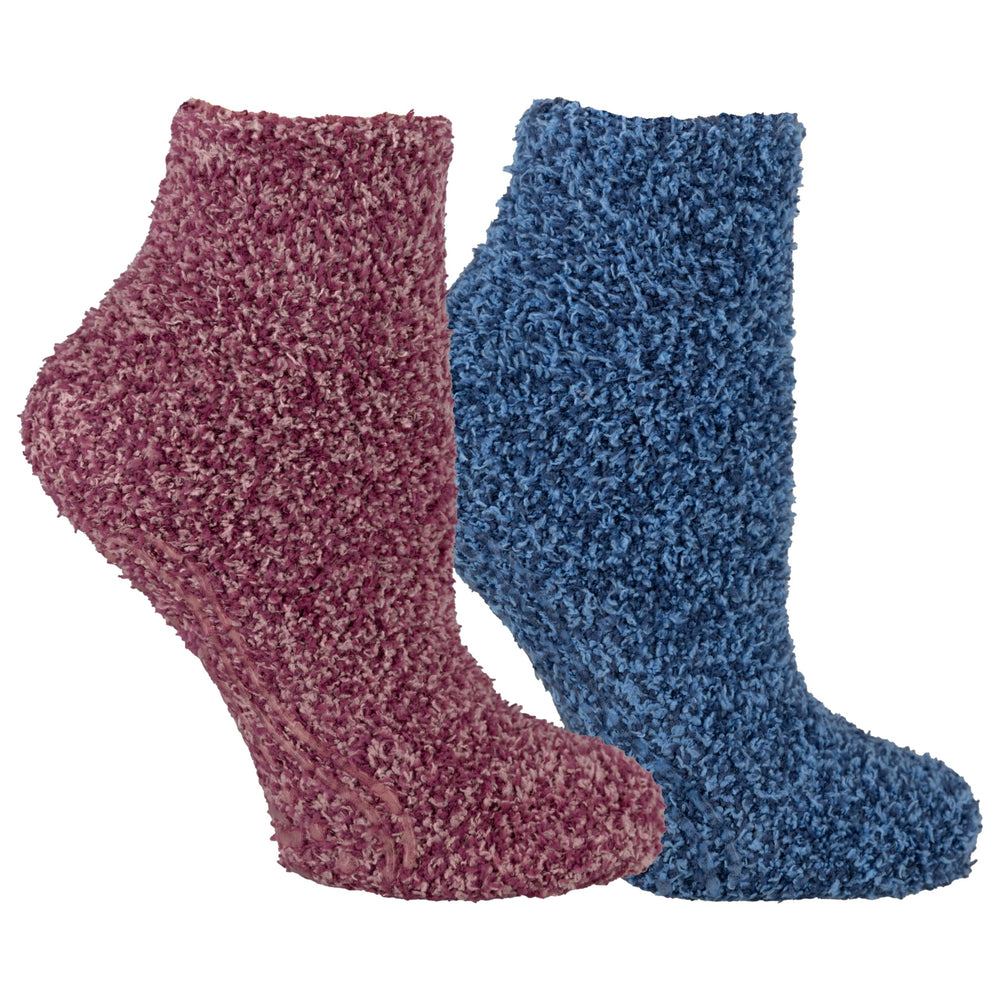 Dr. Scholl's front packaging in pink showing product pair and features, comfort benefit
