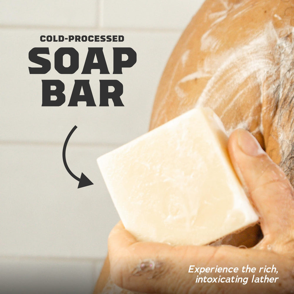 Dr. Squatch bar held in hand illustrating size and long-lasting benefit