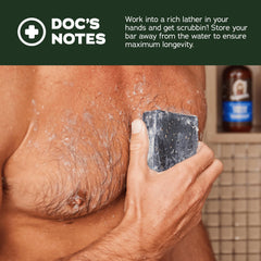 Dr. Squatch bar creating lather in shower demonstrating cleansing and moisturizing benefit