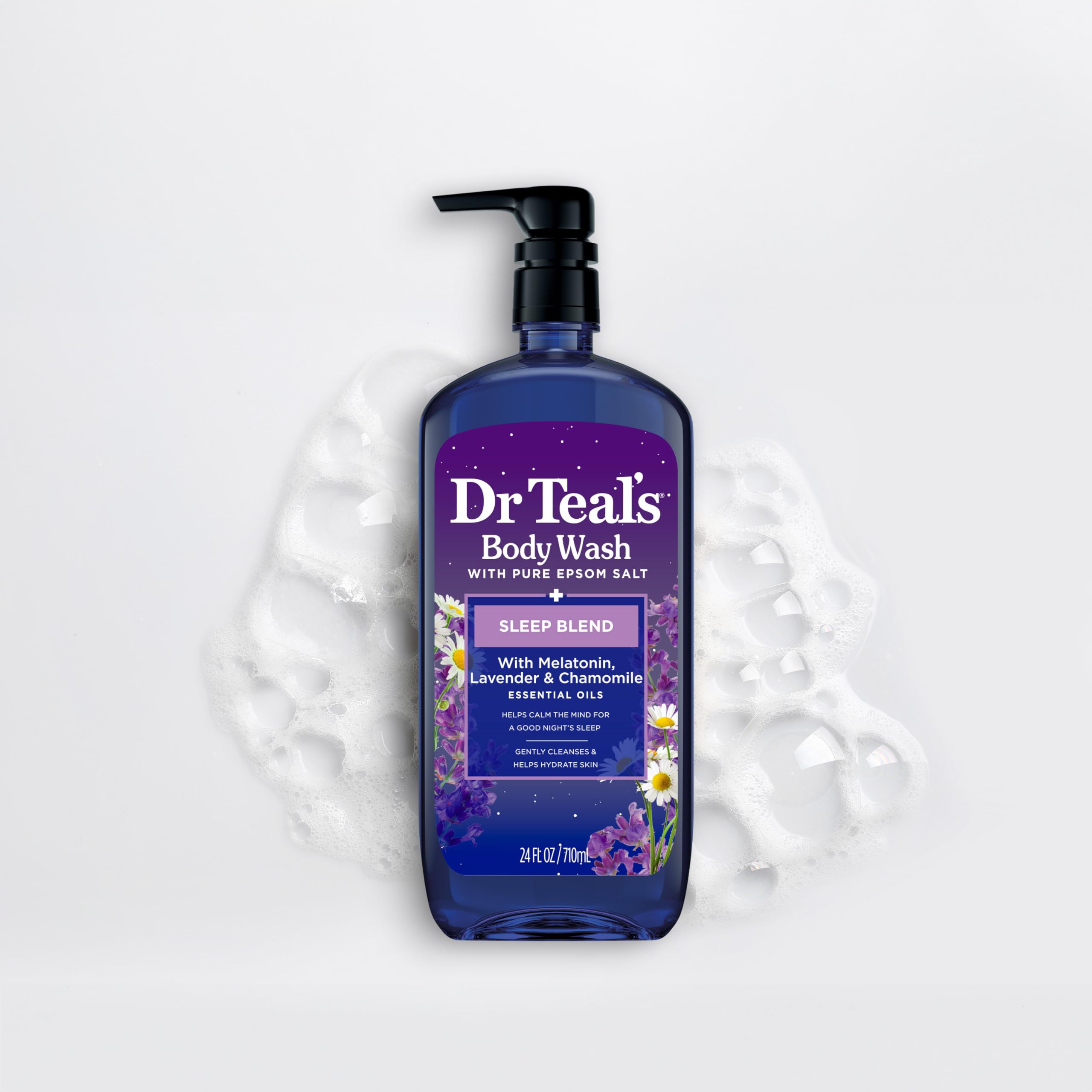 Dr Teal's bottle held in hand to show size and travel-friendly convenience