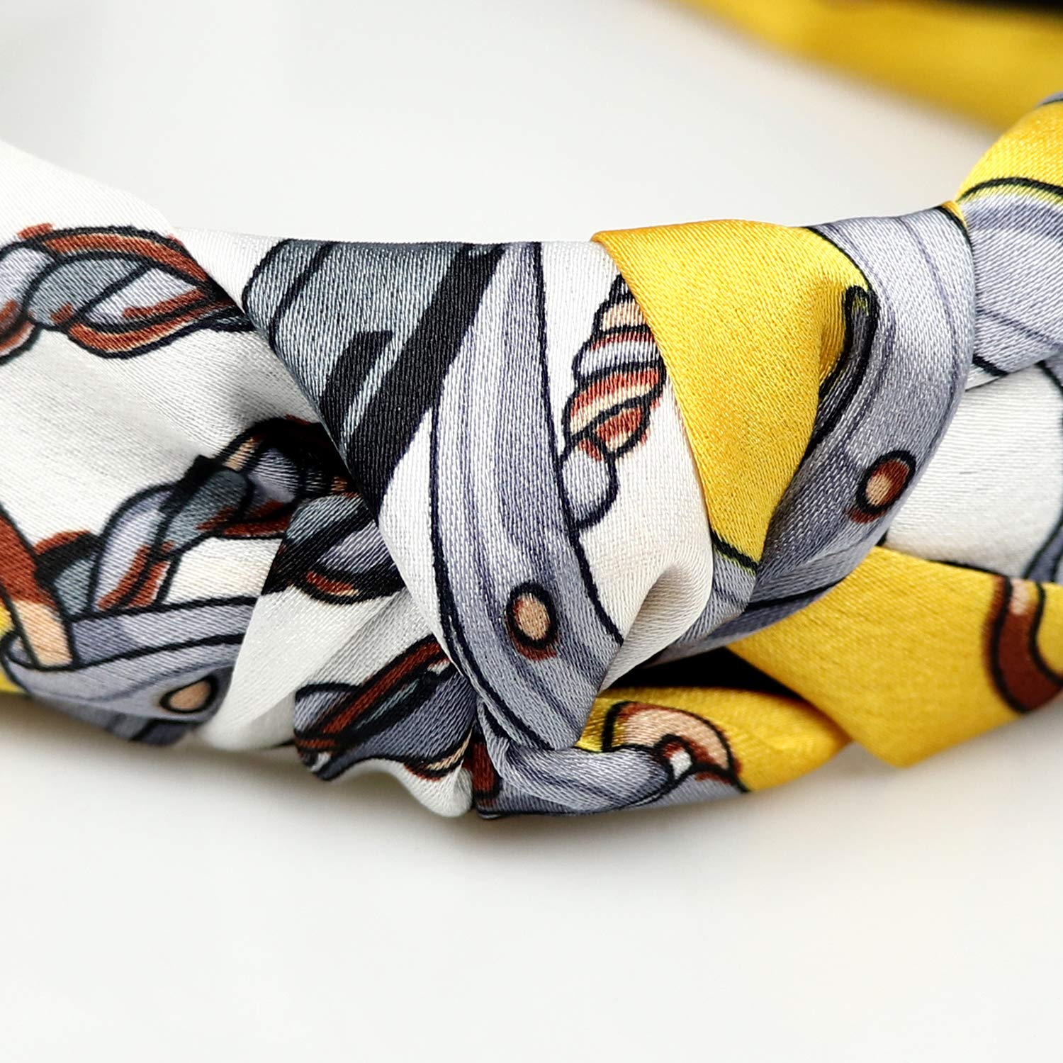 DRESHOW cross knot detail highlighting decorative knot and secure fit benefit