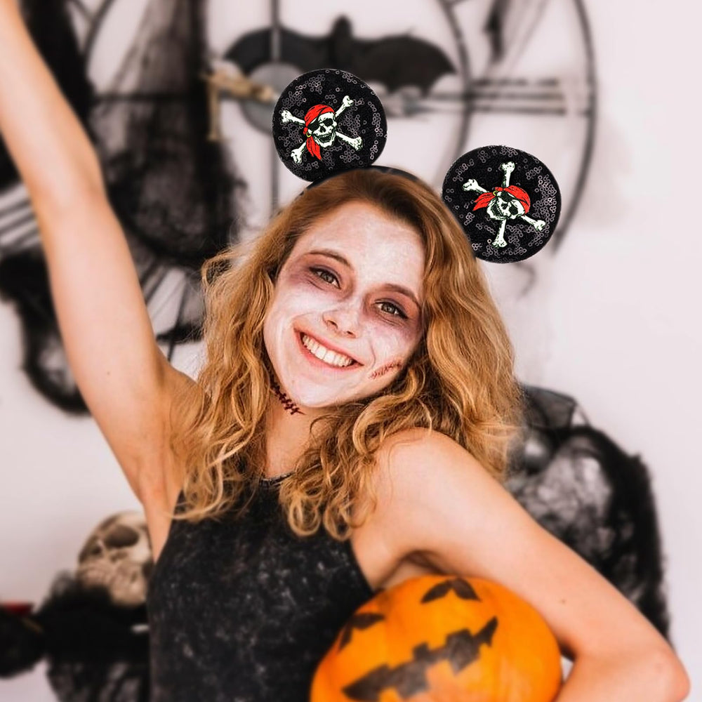 DRESHOW headband bow detail focusing on skull-crossbones motif for standout style