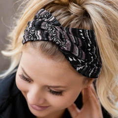 DRESHOW headband in use outdoors keeping hair back and looking polished during activity
