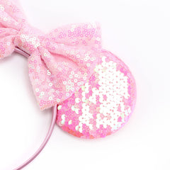 DRESHOW headband in use at a party providing comfortable, secure fit