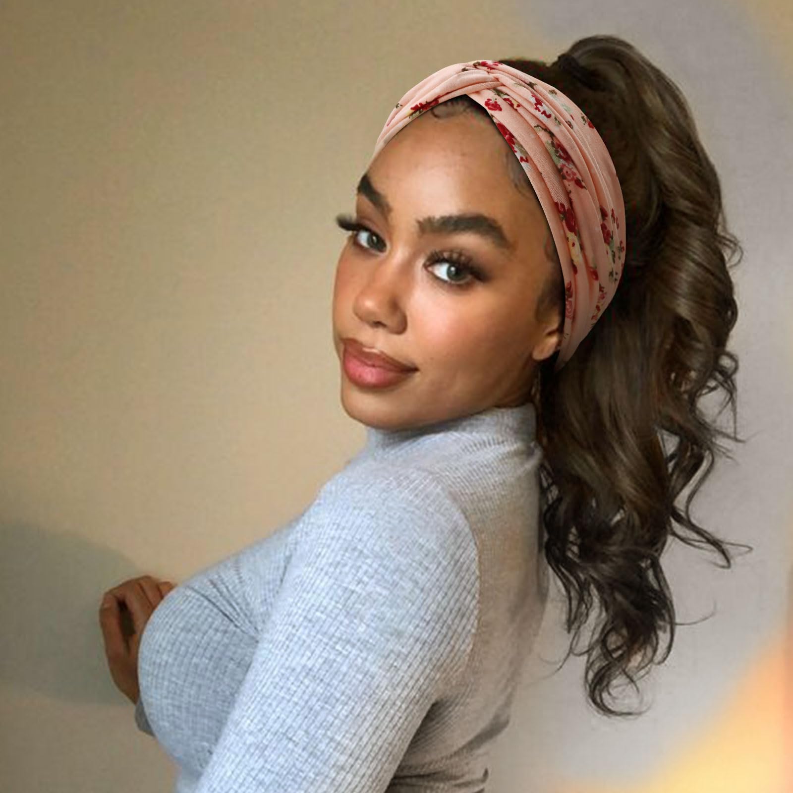 DRESHOW headband worn with ponytail demonstrating secure hold benefit