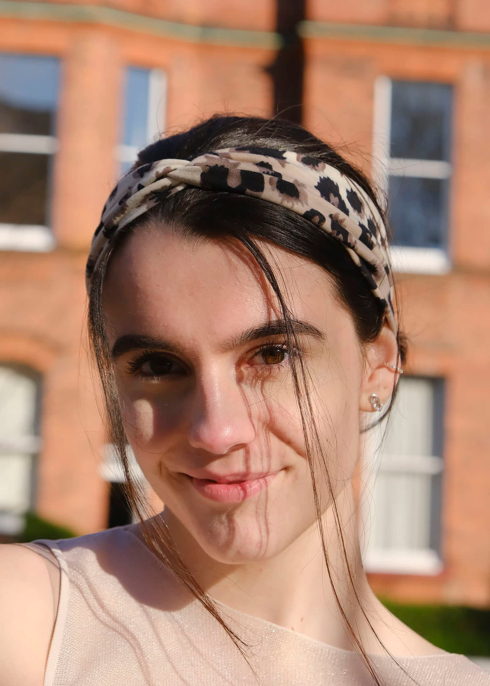 DRESHOW knotted headband front detail adding a stylish focal point