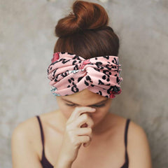 DRESHOW model wearing headband with a bun showing stylish hold and everyday wear benefit