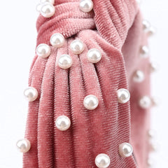 DRESHOW detailed shot of sewn pearls on band adding vintage flair