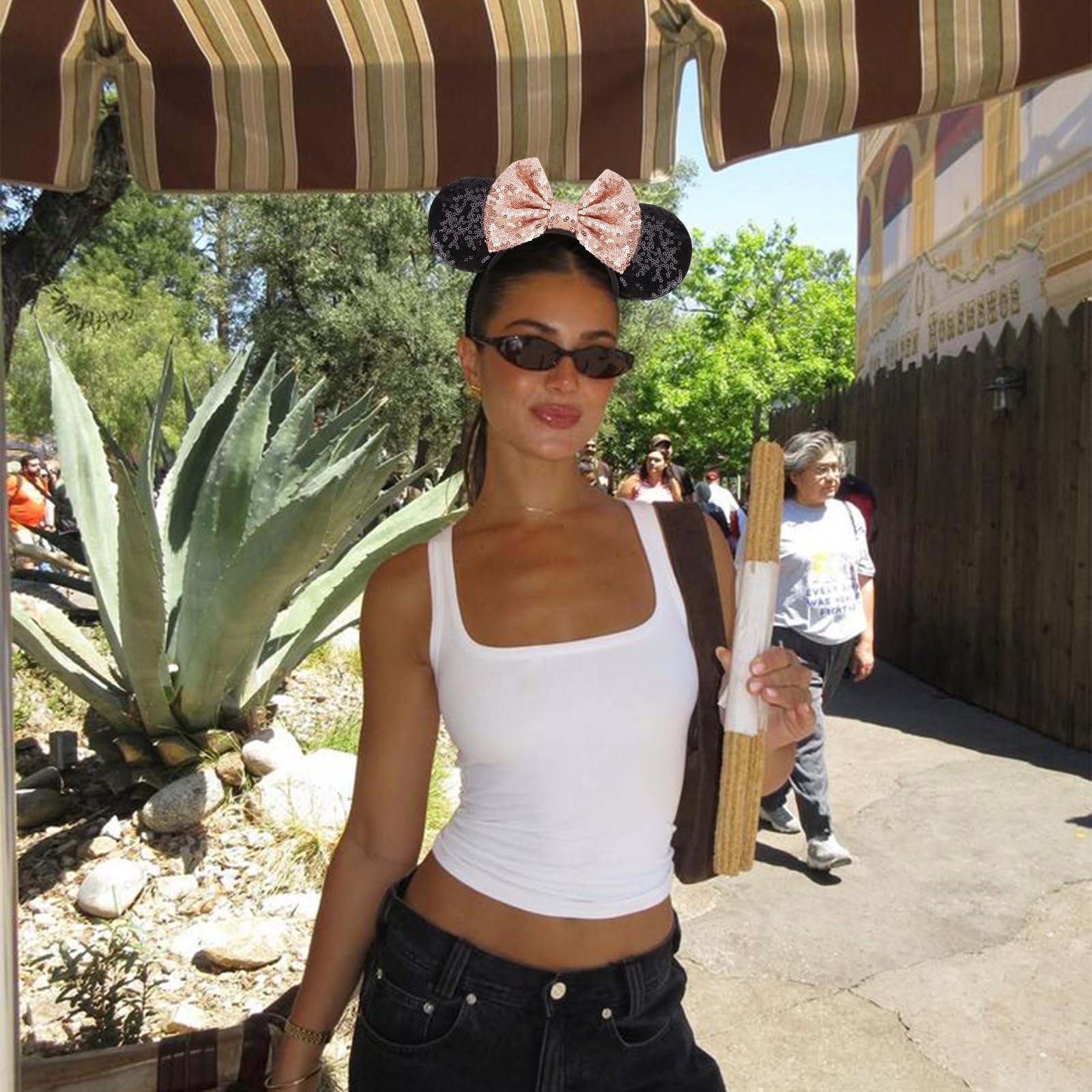 DRESHOW side profile on model demonstrating comfortable fit and visible ears