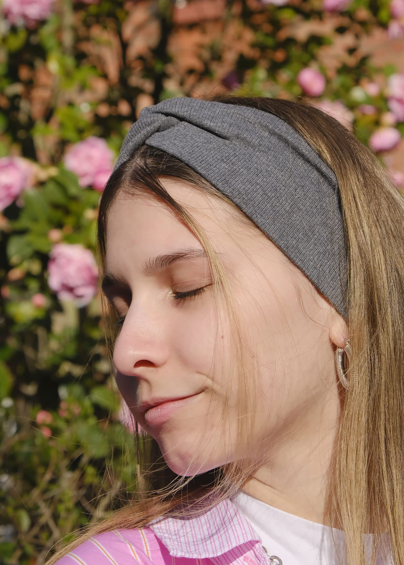 DRESHOW side profile worn on model demonstrating secure fit and ear coverage benefit