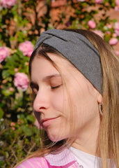 DRESHOW side profile worn on model demonstrating secure fit and ear coverage benefit