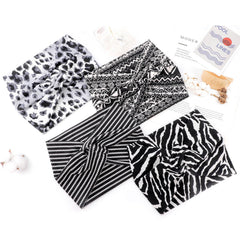 DRESHOW headband beside ruler demonstrating dimensions and one-size fit
