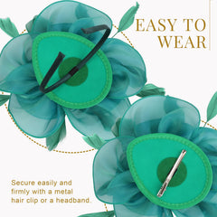 DRESHOW fascinator beside a hand showing scale and manageable size