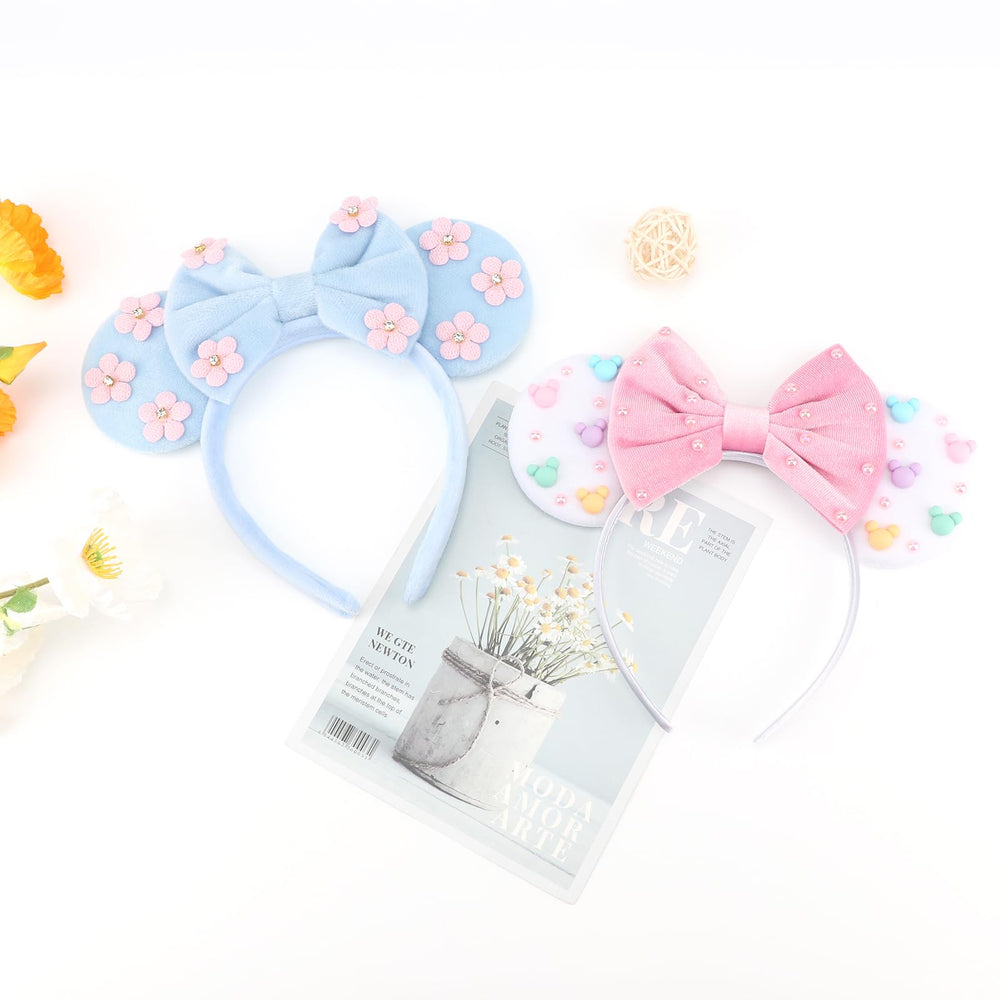 Two DRESHOW headbands styled on table as a ready-to-gift two-pack