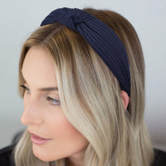 DRESHOW woman practicing yoga wearing headband for secure hold
