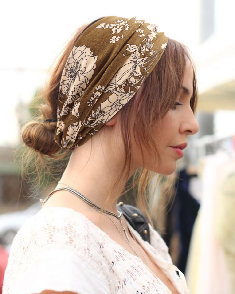 DRESHOW model wearing headband outdoors showing secure fit and everyday style benefit