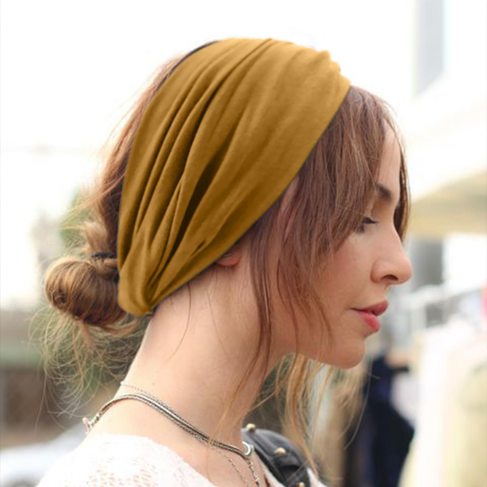 DRESHOW headband worn in hair demonstrating secure hold and tidy look benefit