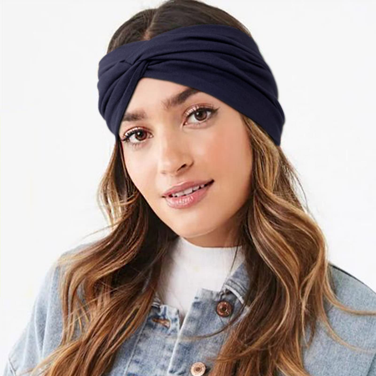 DRESHOW headband worn with ponytail demonstrating secure hold during activity