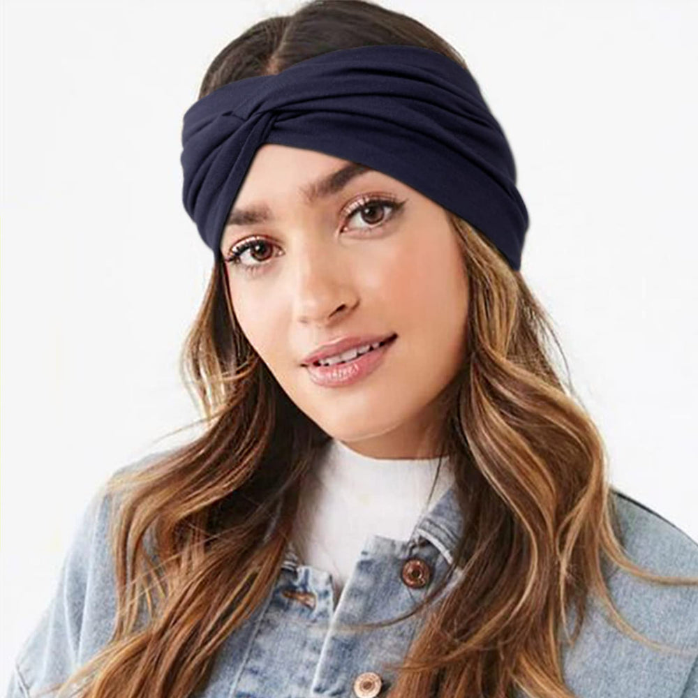 DRESHOW headband worn with ponytail demonstrating secure hold during activity