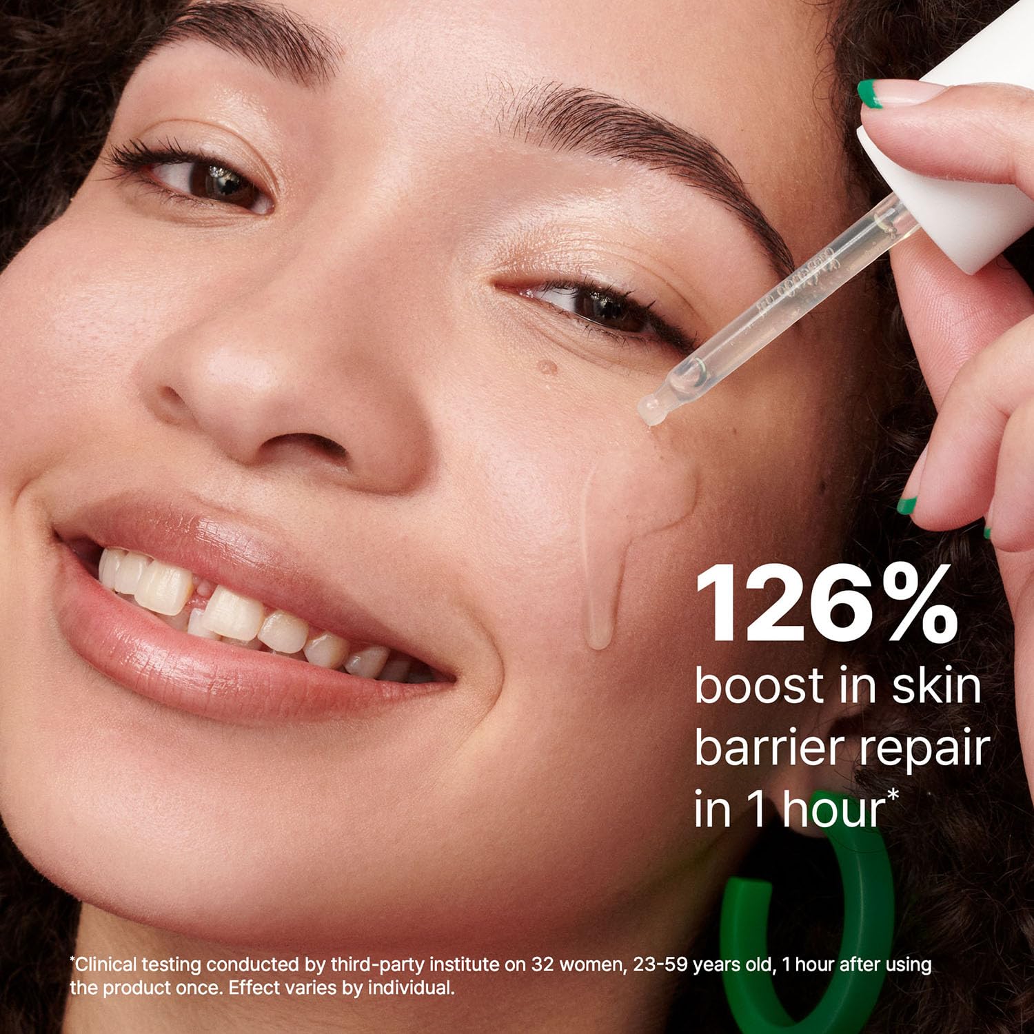 Dr.Jart+ serum pump in hand to show product size and convenient dispensing