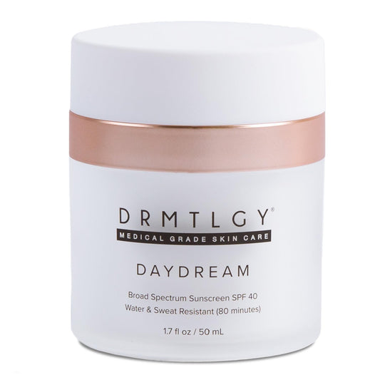 DRMTLGY front packaging showing sunscreen tube and label benefits