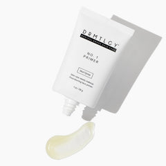 DRMTLGY primer spread on back of hand showing blurring effect and hydration