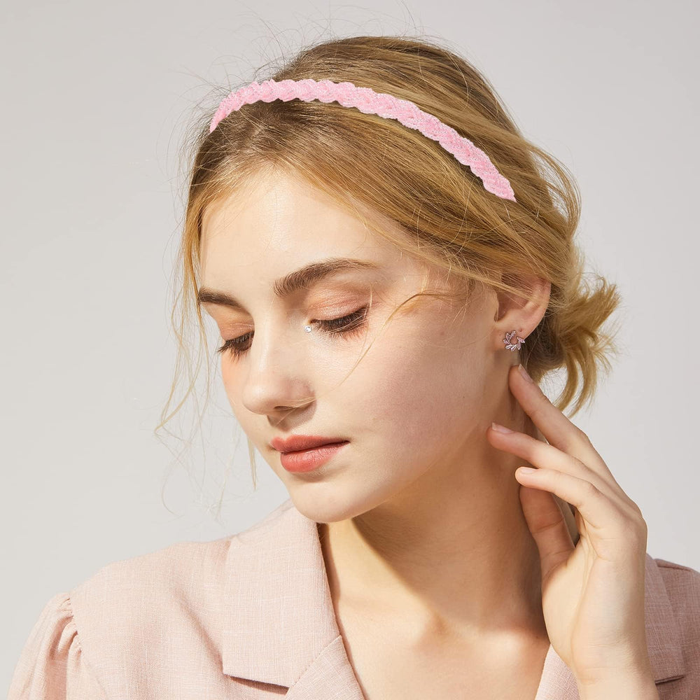 Drnytunk headband held in hand to show scale and flexible, bendable construction