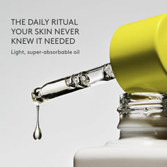 Drunk Elephant oil texture on skin demonstrating quick absorption and softness