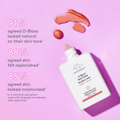 Drunk Elephant peachy-pink serum texture close-up showing lightweight, blendable finish