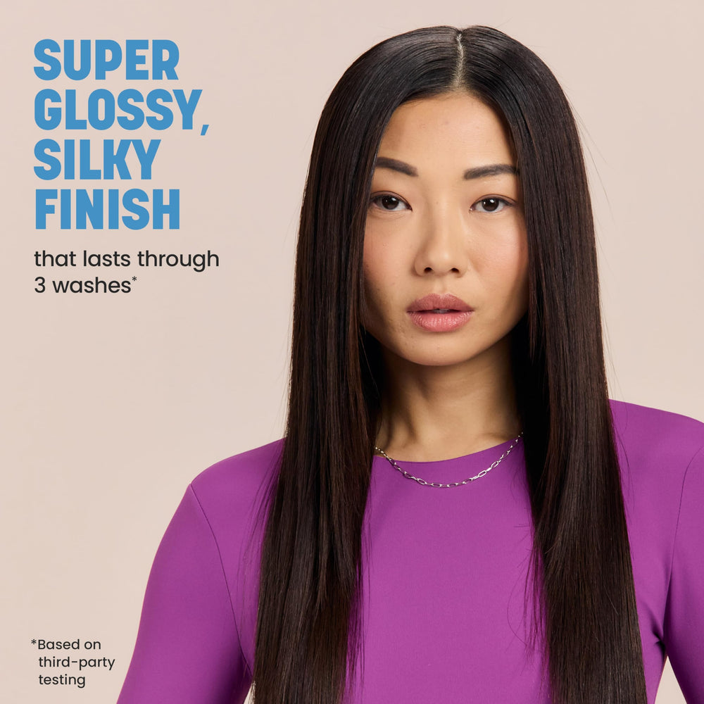 Drybar applied on damp hair mid-lengths demonstrating frizz reduction benefit