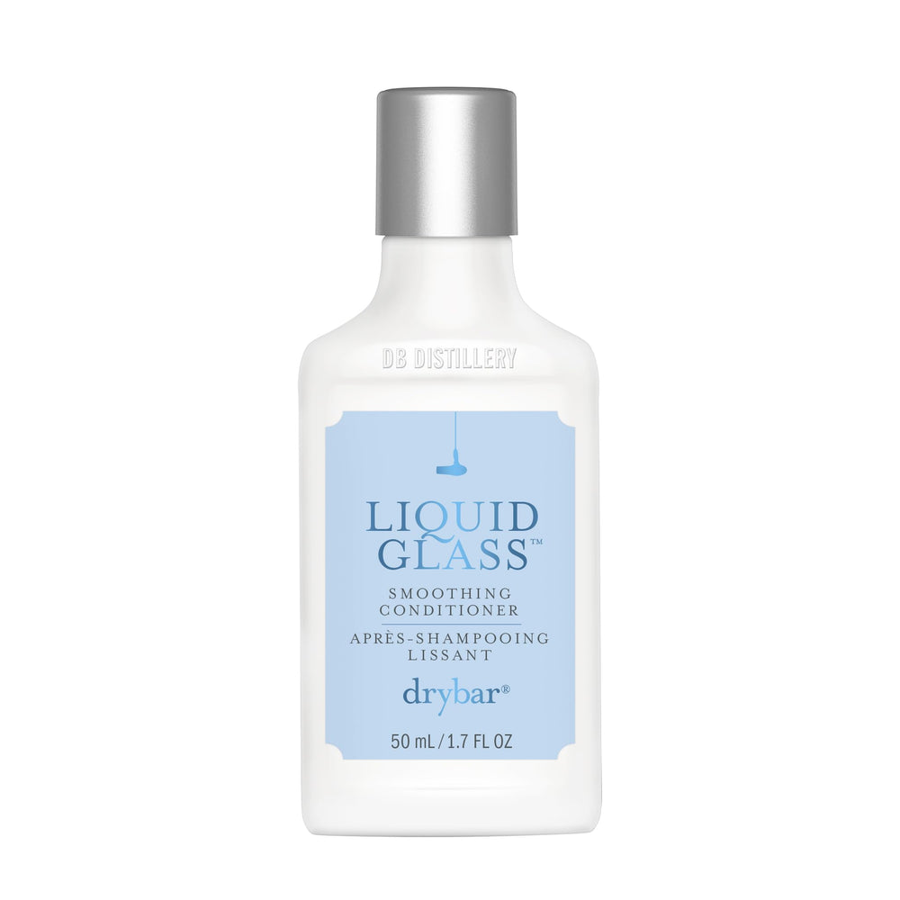 Drybar travel bottle front view showing branding and compact design benefit