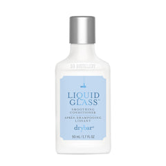 Drybar travel bottle front view showing branding and compact design benefit