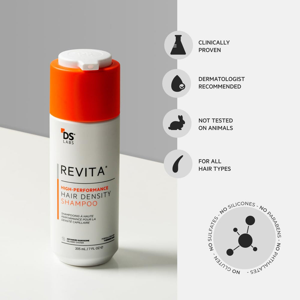 DS Laboratories Revita shampoo staged with styling tools, showing preparation for voluminous hair