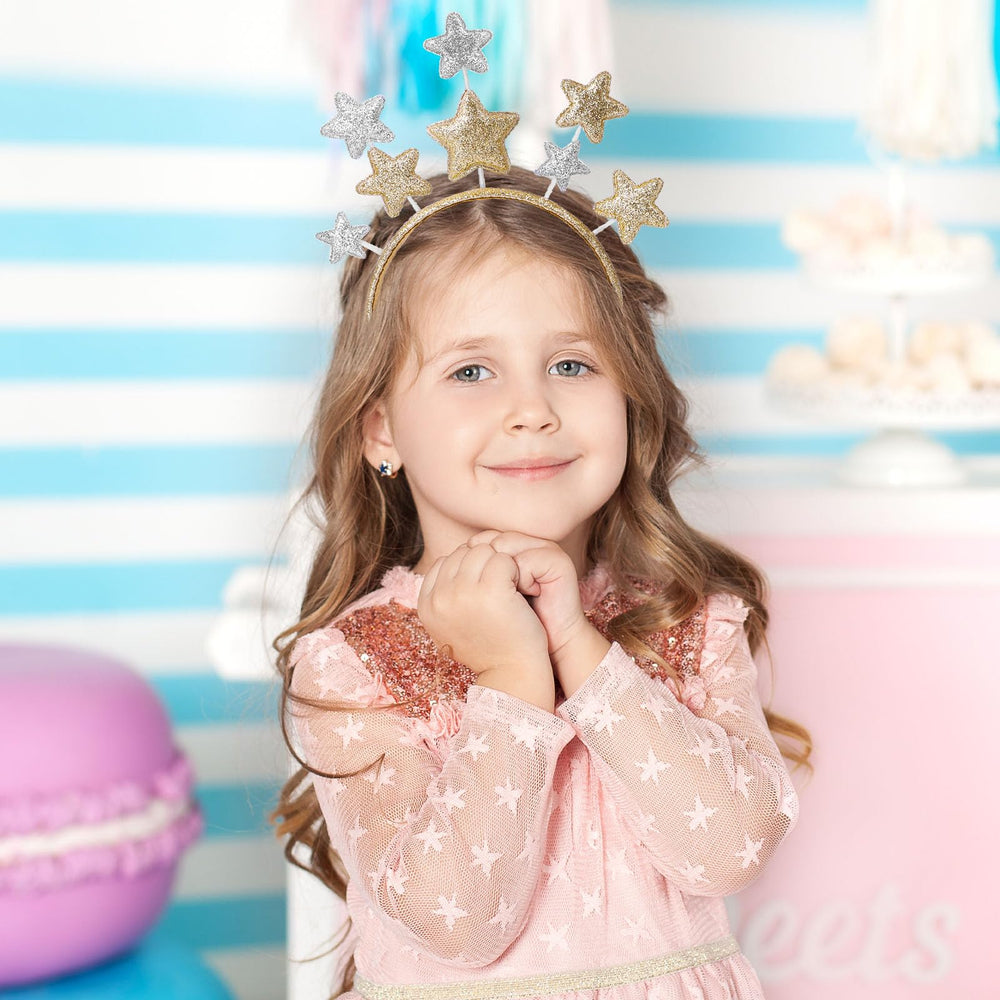 DSLSQD headband held in hand for scale, demonstrating compact size and portability