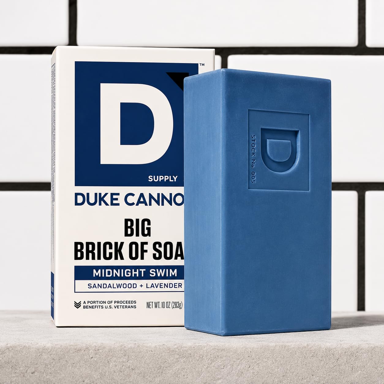 Duke Cannon cut piece held in hand demonstrating easier grip and portioning