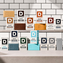 Duke Cannon label detail displaying scent notes and ingredient clarity benefit